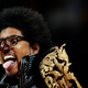 In this Feb. 25, 2008, file photo, Greg “Shock G” Jacobs, leader for Digital Underground, performs The Humpty Dance during a halftime appearance in the Detroit Pistons’ NBA basketball game against the Denver Nuggets.